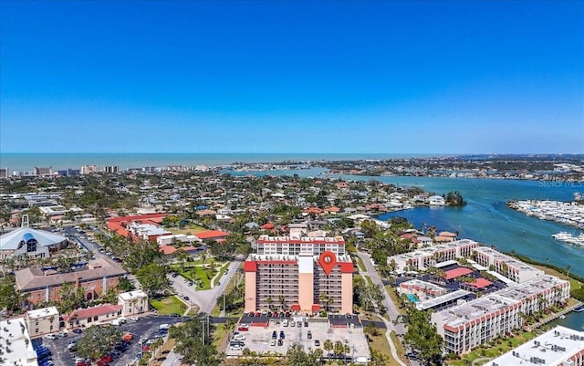 drone / aerial view with a city view and a water view