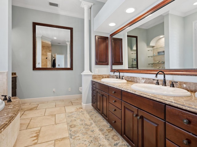 full bath with ornate columns, a sink, ornamental molding, and visible vents