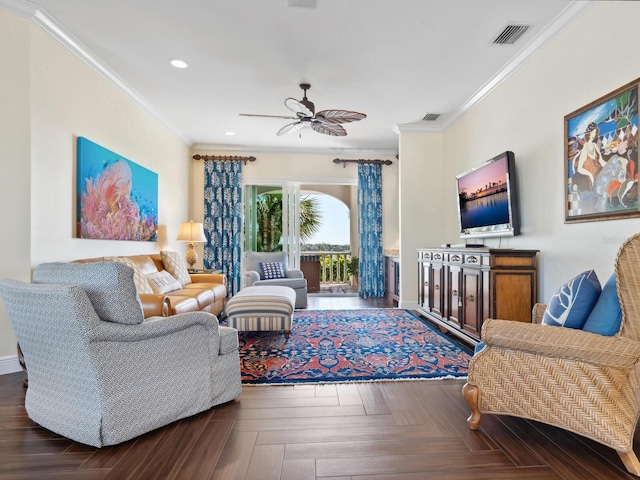 living area featuring ornamental molding, visible vents, ceiling fan, and recessed lighting