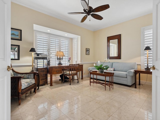 interior space with baseboards, a ceiling fan, and crown molding