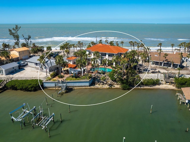 drone / aerial view with a water view