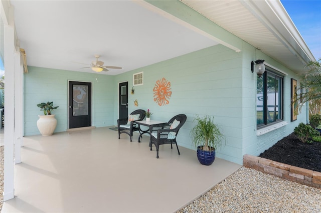 view of patio with a porch and ceiling fan