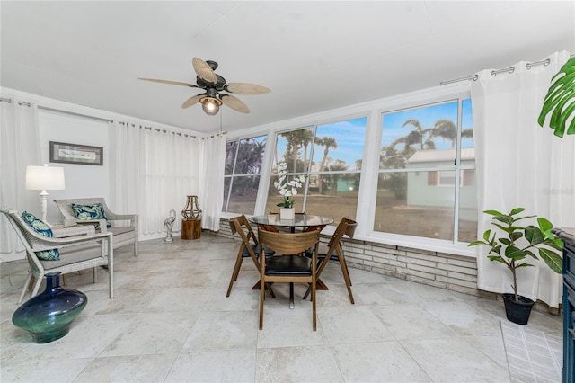 dining area with a ceiling fan