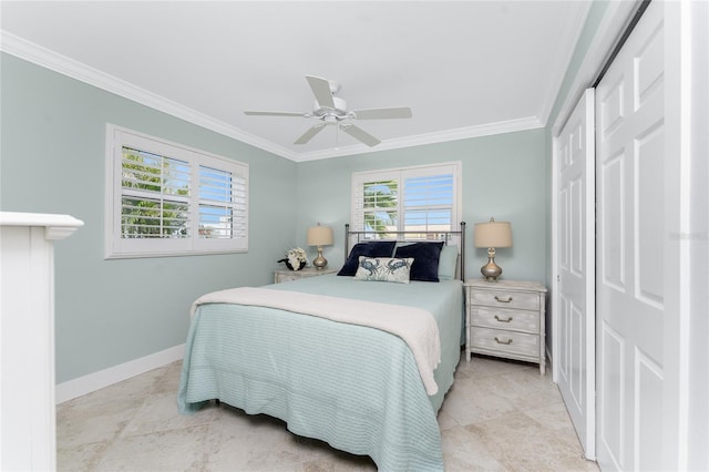 bedroom featuring a closet, baseboards, ornamental molding, and a ceiling fan