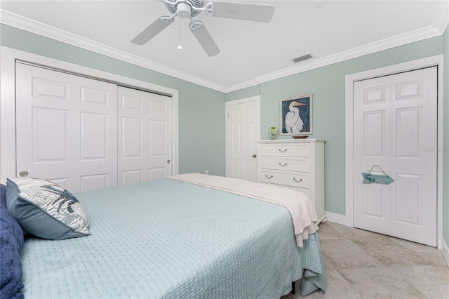 bedroom featuring crown molding, baseboards, visible vents, and a closet