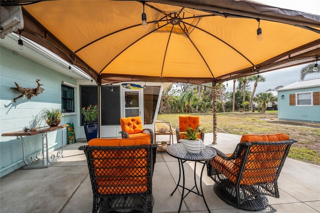 view of patio / terrace with a gazebo and outdoor lounge area