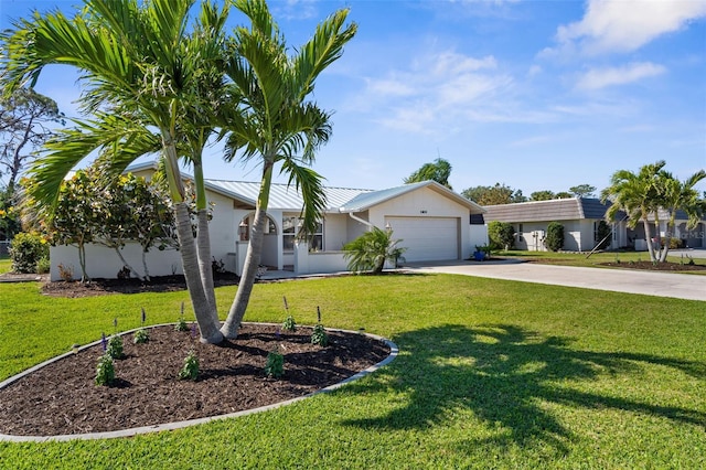 201 Cavallini Dr, Nokomis, FL 34275 - ranch-style house featuring a front lawn, driveway, an attached garage, and metal roof