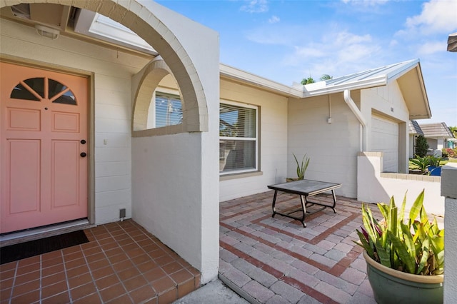 201 Cavallini Dr, Nokomis, FL 34275 - doorway to property featuring a garage