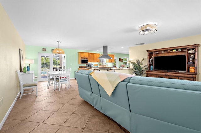 201 Cavallini Dr, Nokomis, FL 34275 - living area with baseboards, visible vents, recessed lighting, and light tile patterned floors