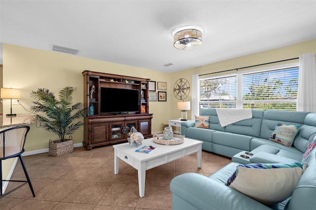 201 Cavallini Dr, Nokomis, FL 34275 - living room featuring baseboards, visible vents, and tile patterned floors