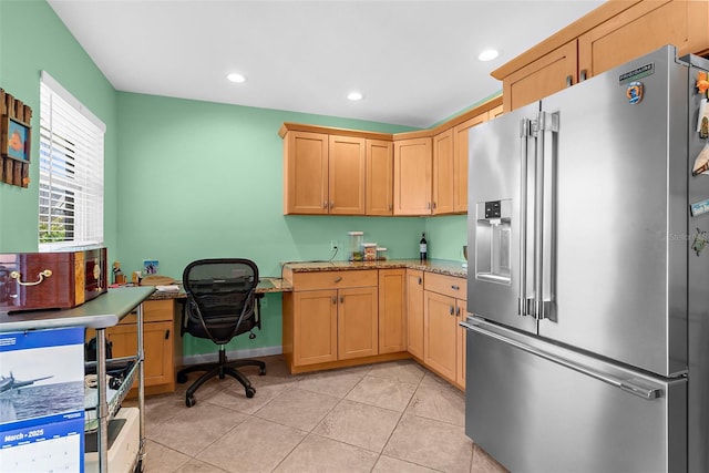 201 Cavallini Dr, Nokomis, FL 34275 - kitchen featuring high end fridge, light stone countertops, light tile patterned floors, light brown cabinets, and recessed lighting