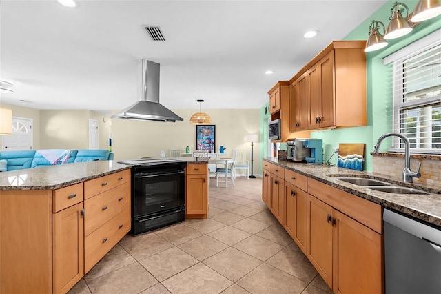201 Cavallini Dr, Nokomis, FL 34275 - kitchen featuring visible vents, appliances with stainless steel finishes, a sink, open floor plan, and wall chimney range hood