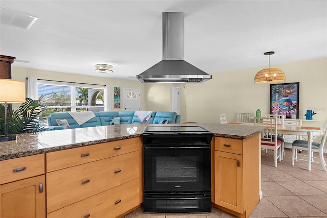 201 Cavallini Dr, Nokomis, FL 34275 - kitchen with black electric range oven, light tile patterned floors, open floor plan, light brown cabinets, and extractor fan