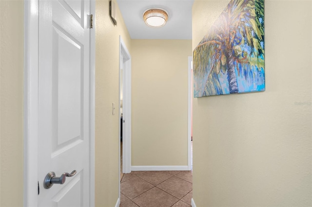 201 Cavallini Dr, Nokomis, FL 34275 - hall featuring tile patterned flooring and baseboards