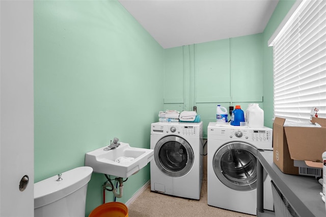 201 Cavallini Dr, Nokomis, FL 34275 - laundry room with a sink and washing machine and dryer