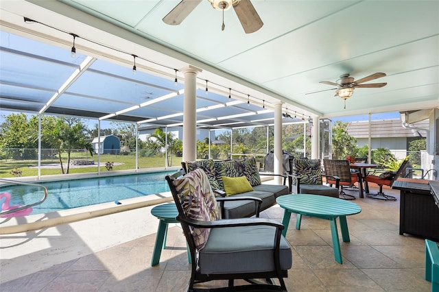 201 Cavallini Dr, Nokomis, FL 34275 - exterior space with outdoor lounge area, a lanai, a patio, and a ceiling fan