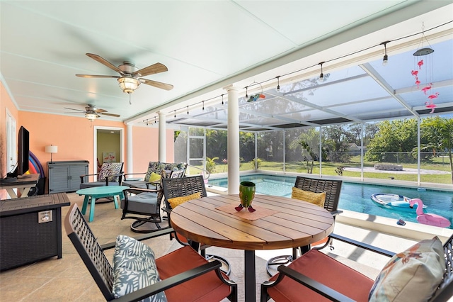 201 Cavallini Dr, Nokomis, FL 34275 - sunroom with a ceiling fan and a pool