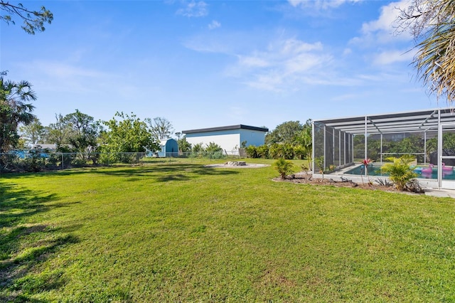 201 Cavallini Dr, Nokomis, FL 34275 - view of yard featuring an outdoor pool, glass enclosure, and fence