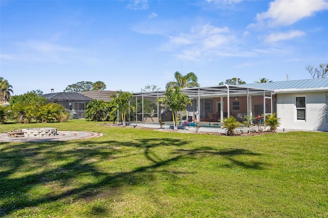 201 Cavallini Dr, Nokomis, FL 34275 - back of property featuring a lawn, an outdoor pool, and glass enclosure