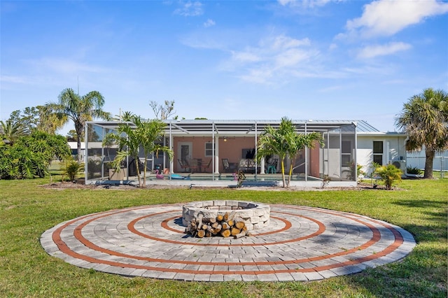 201 Cavallini Dr, Nokomis, FL 34275 - rear view of property featuring glass enclosure, a swimming pool, stucco siding, and a lawn