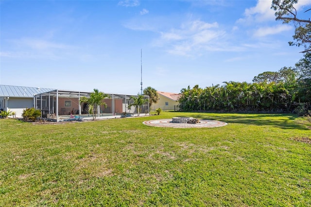 201 Cavallini Dr, Nokomis, FL 34275 - view of yard with a fire pit, a lanai, and a swimming pool