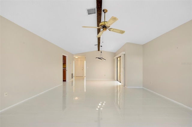 spare room featuring light tile patterned floors, baseboards, visible vents, lofted ceiling, and ceiling fan