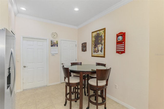 dining area featuring light tile patterned floors, baseboards, recessed lighting, and crown molding