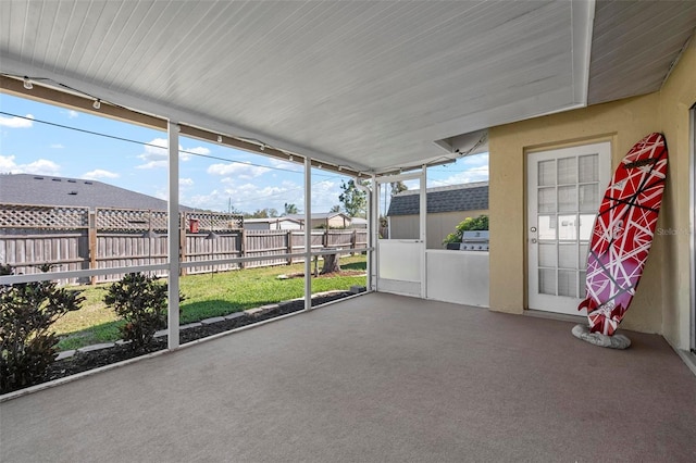 view of unfurnished sunroom