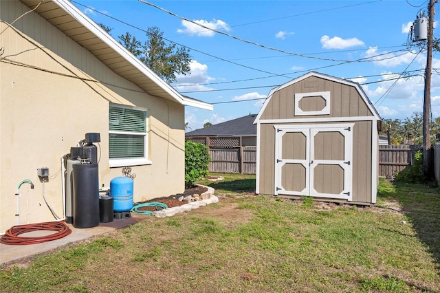 view of shed featuring a fenced backyard