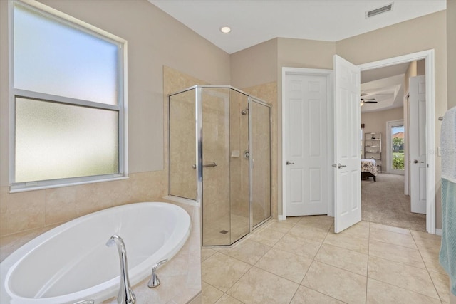 ensuite bathroom featuring visible vents, a stall shower, tile patterned flooring, a bath, and connected bathroom