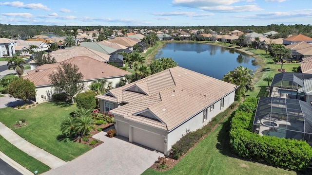 bird's eye view with a residential view and a water view