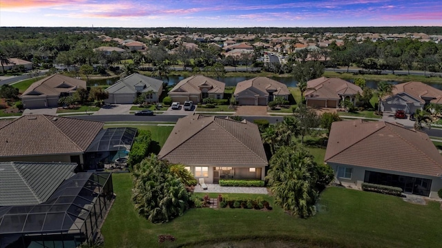 aerial view at dusk with a residential view