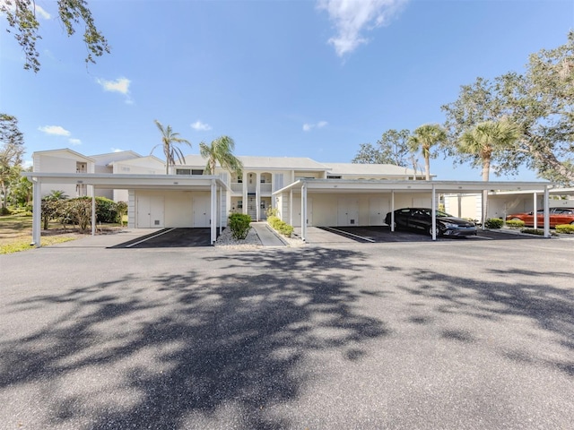 view of front of property with covered parking