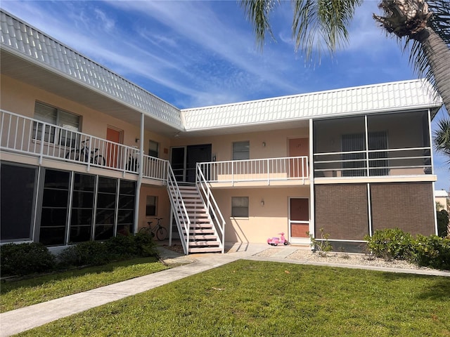 view of property with stairway