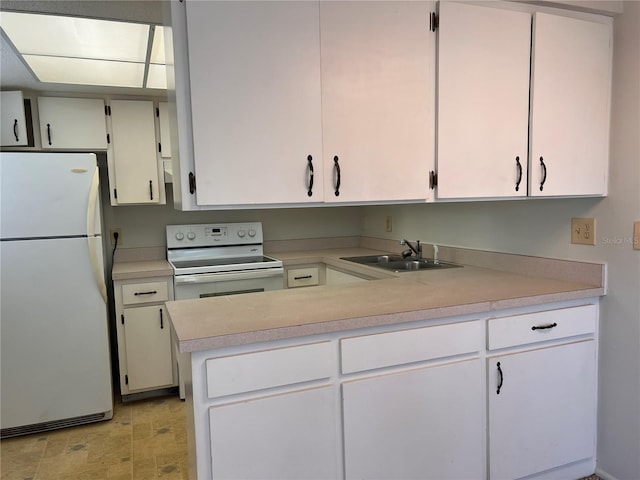 kitchen featuring a sink, white appliances, white cabinetry, and light countertops