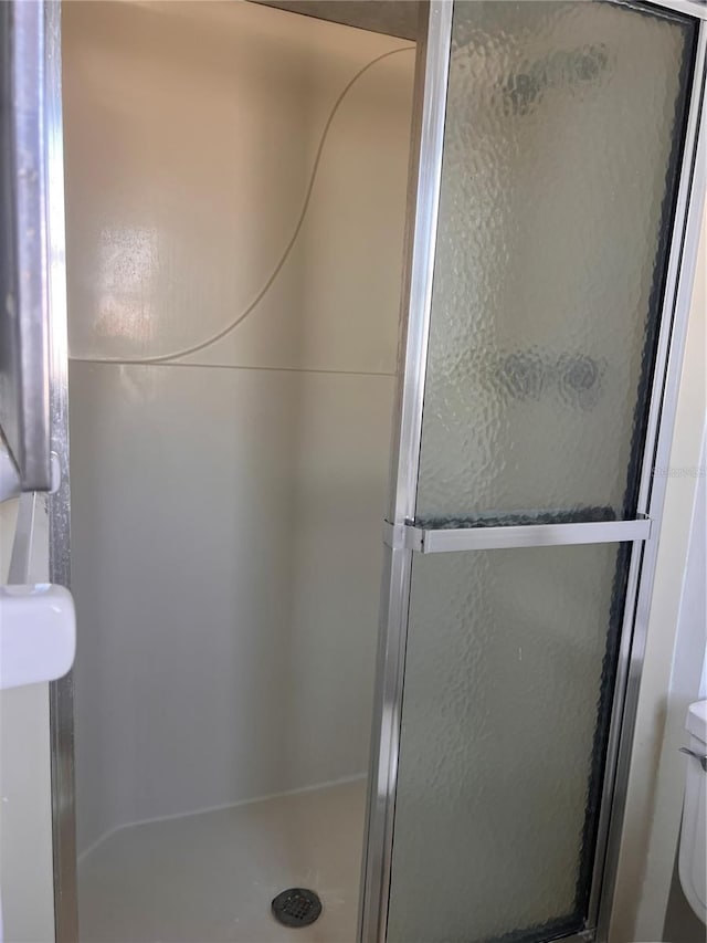 full bath featuring a stall shower