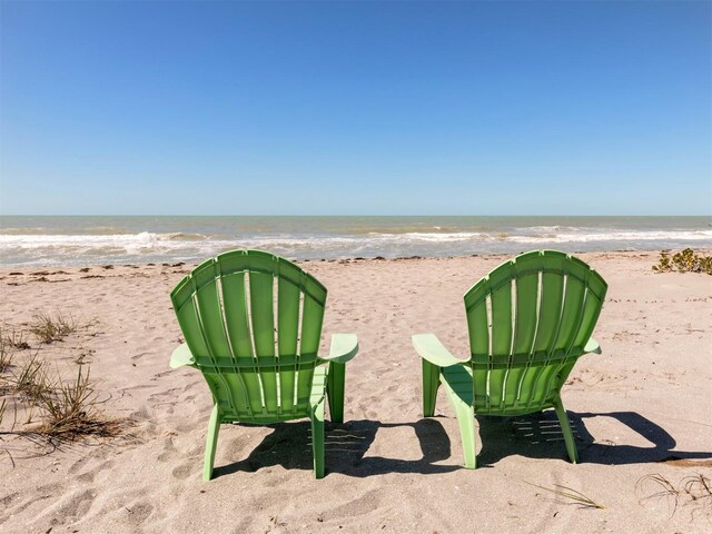 view of community featuring a view of the beach and a water view