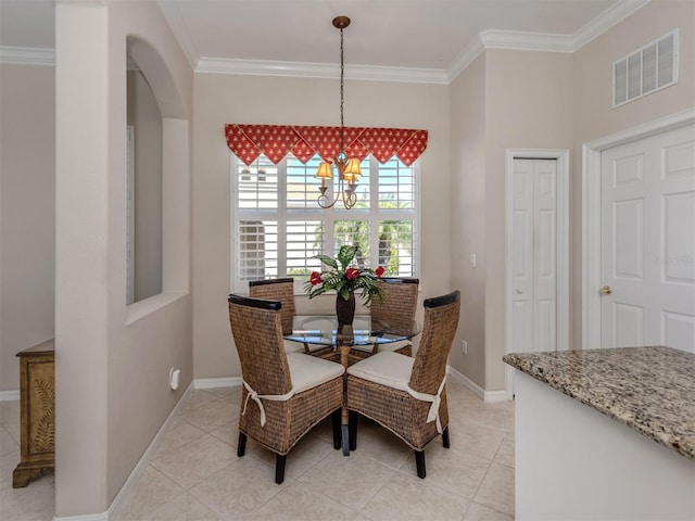 dining space with baseboards, visible vents, an inviting chandelier, light tile patterned flooring, and ornamental molding