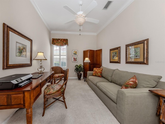 home office with visible vents, crown molding, baseboards, light colored carpet, and ceiling fan