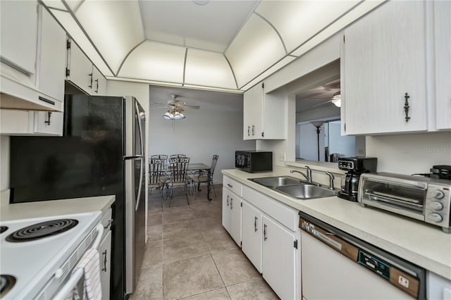358 Pineview Dr, Venice, FL 34293 - kitchen with white appliances, light countertops, a ceiling fan, and a sink