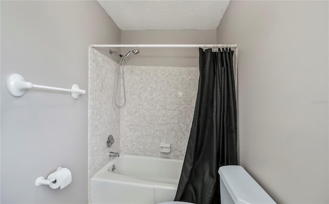 358 Pineview Dr, Venice, FL 34293 - bathroom with shower / bath combo with shower curtain, a textured ceiling, and toilet