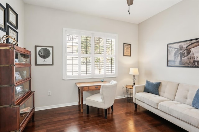 office area with baseboards and wood finished floors