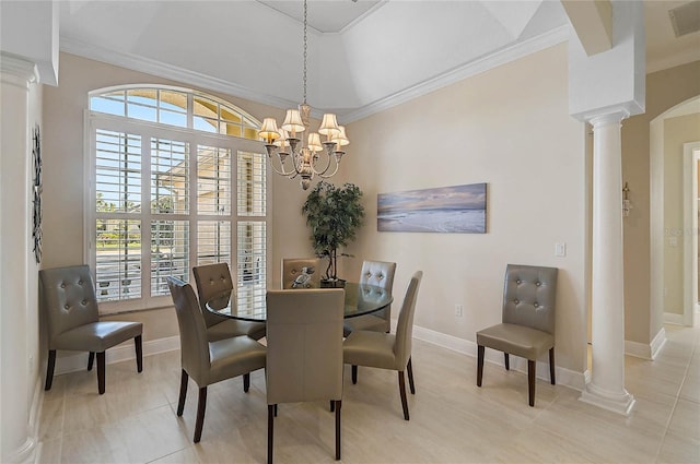 dining room with a notable chandelier, ornamental molding, light tile patterned flooring, and ornate columns