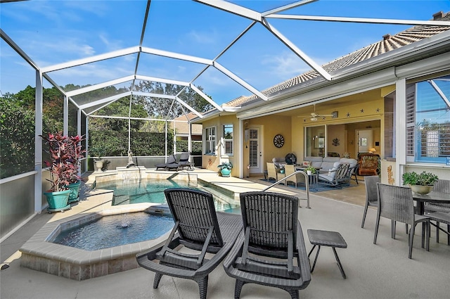 outdoor pool with an outdoor living space, a patio, an in ground hot tub, and ceiling fan