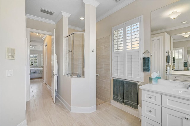 bathroom with visible vents, ensuite bathroom, a tile shower, crown molding, and vanity