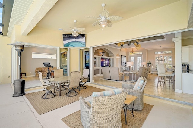 view of patio / terrace with a ceiling fan and french doors