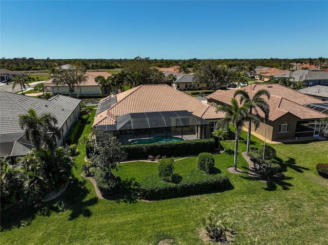 birds eye view of property with a residential view