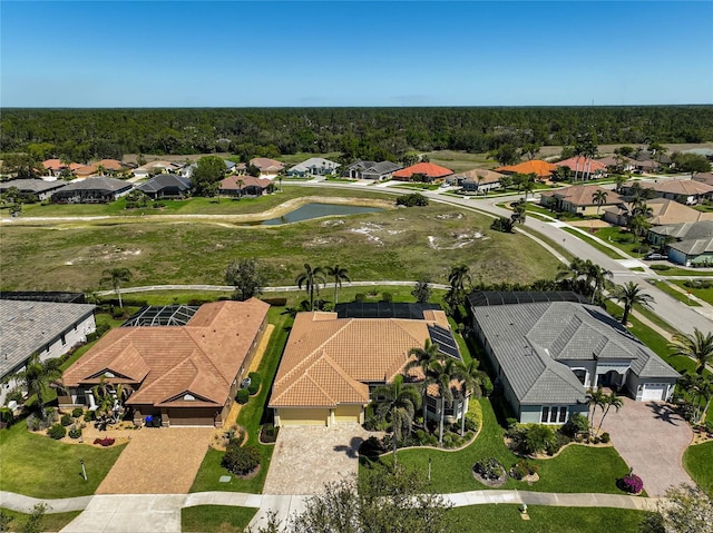 birds eye view of property featuring a residential view and a water view