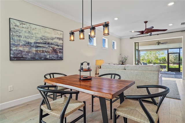 dining space with baseboards, recessed lighting, light wood-style floors, ceiling fan, and crown molding