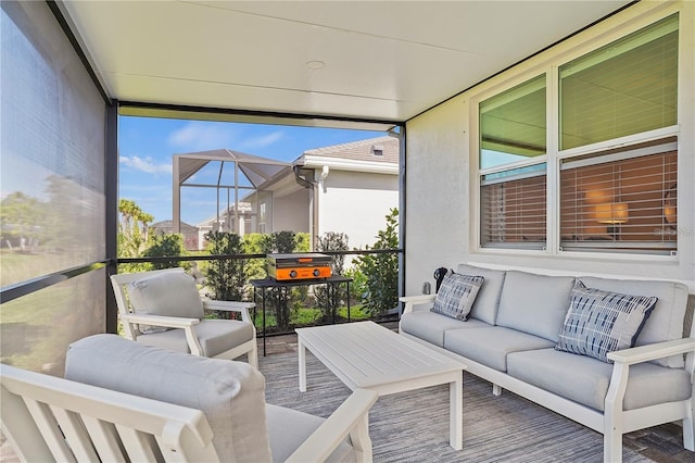 sunroom with an outdoor hangout area